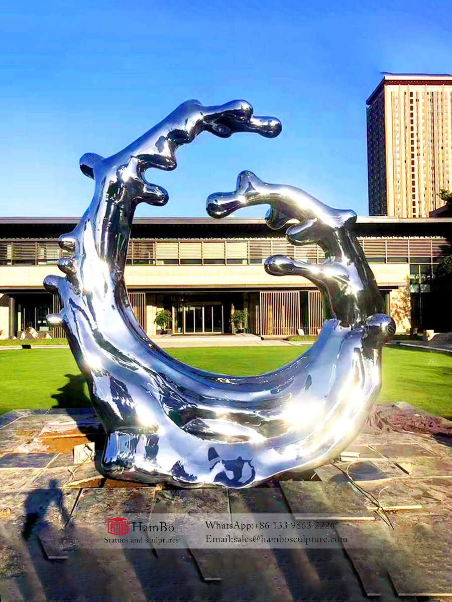 Real estate stainless steel wave sculpture