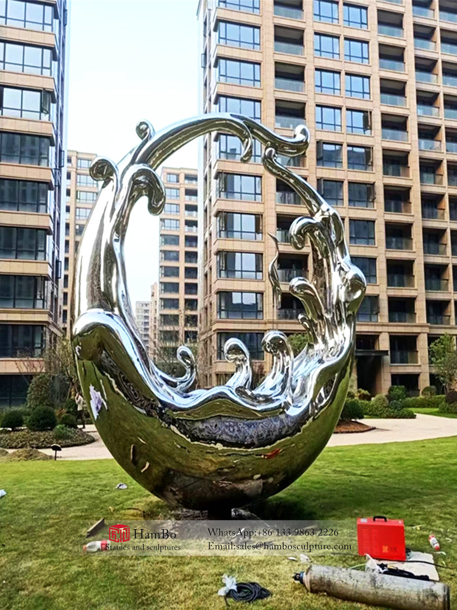 Real estate stainless steel wave sculpture