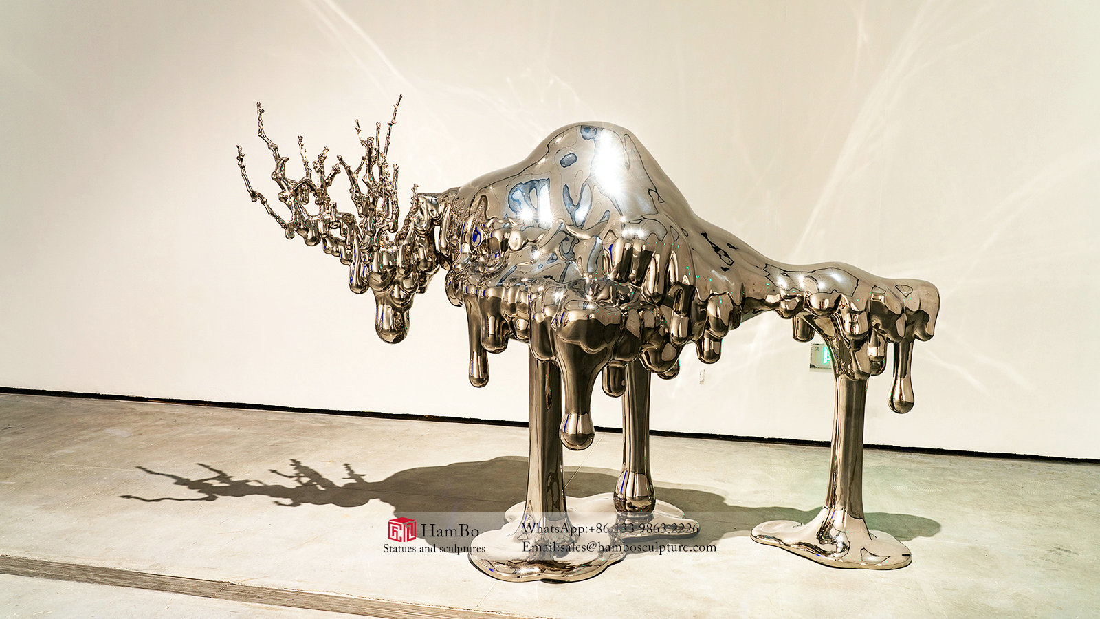Real estate stainless steel wave sculpture